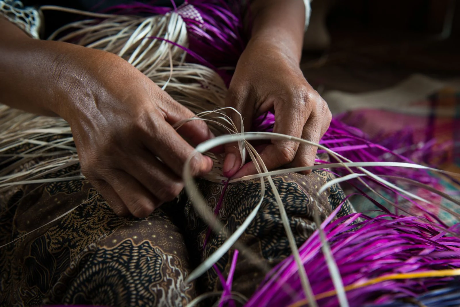 Filipino artisan weaving traditional handicraft